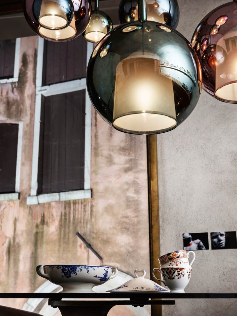 The Enduring Elegance of Hand-Forged Metal and Crystal in Luxury Lighting